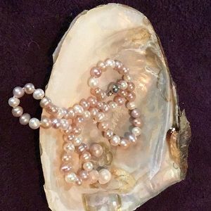 Akoya 16” multi colored pearls.